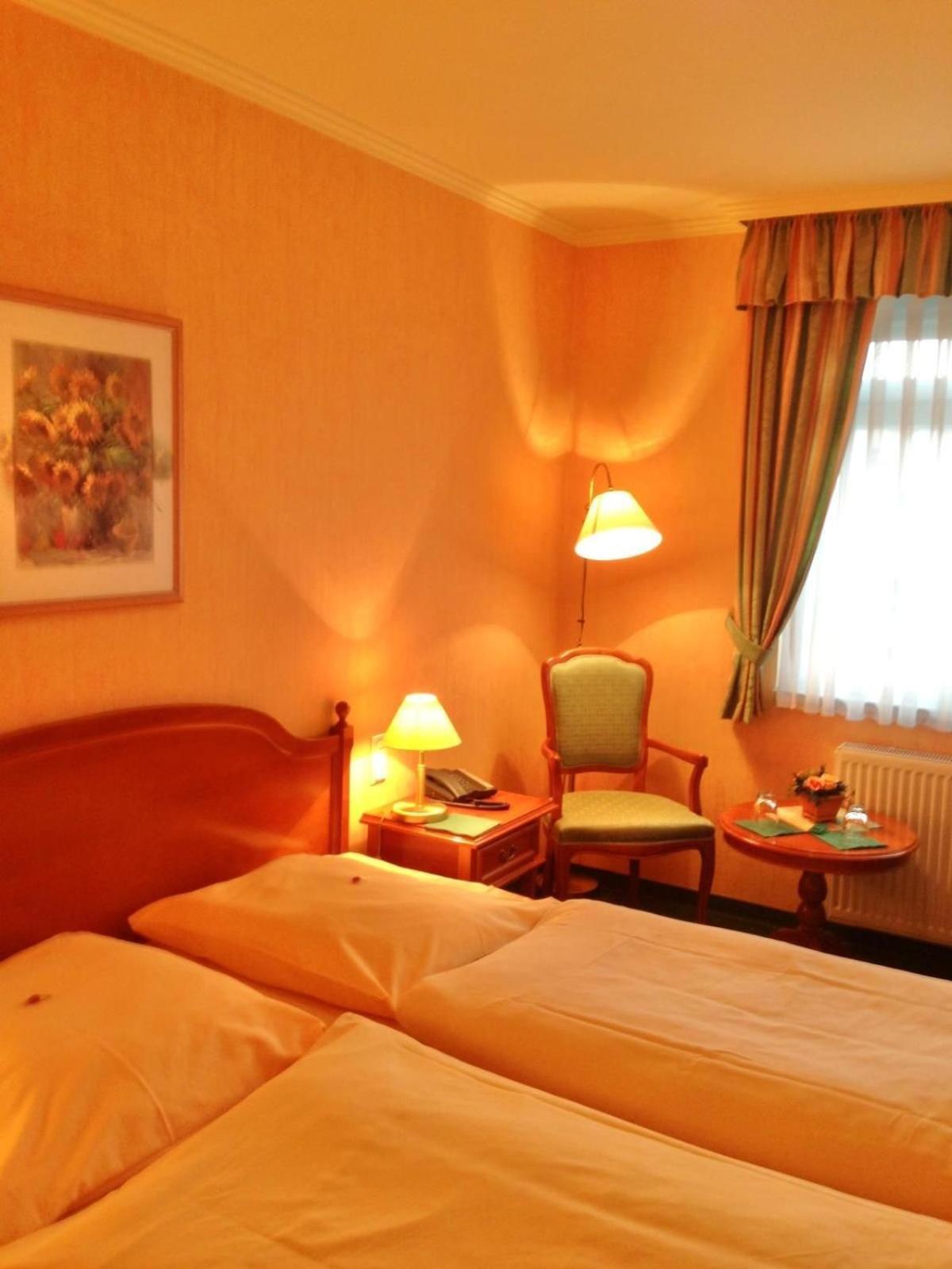 Pension Alter Kutschenbauer ヴェルニゲローデ 部屋 写真