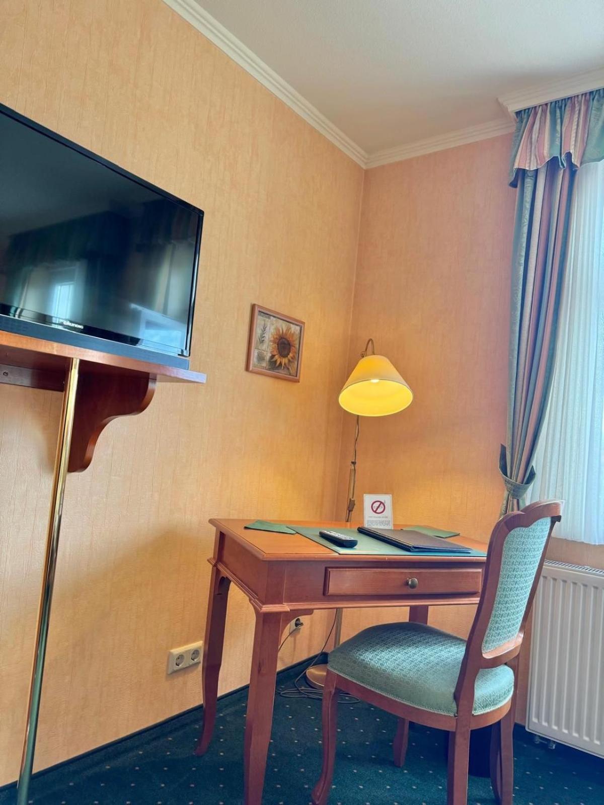 Pension Alter Kutschenbauer ヴェルニゲローデ 部屋 写真