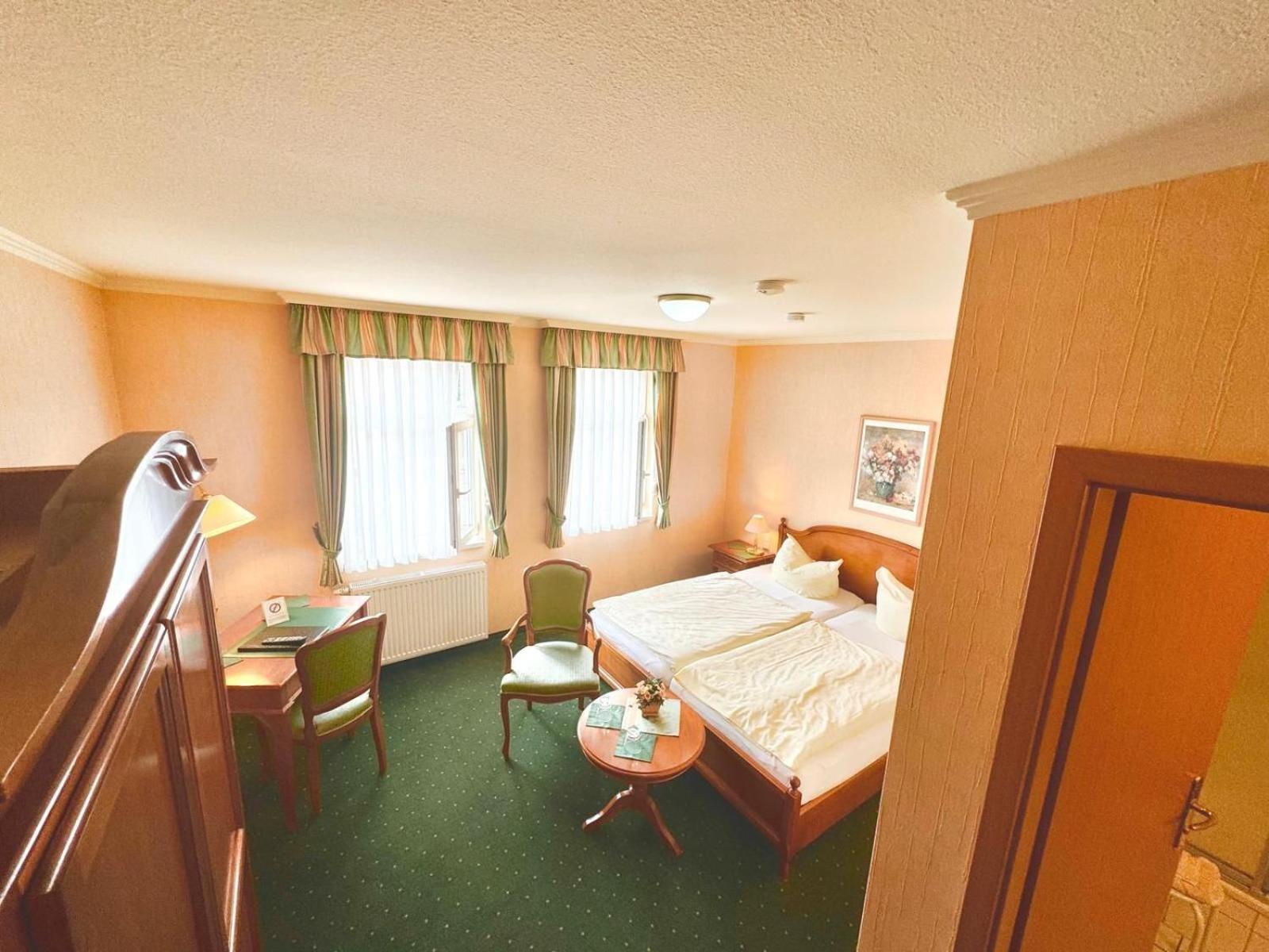 Pension Alter Kutschenbauer ヴェルニゲローデ 部屋 写真