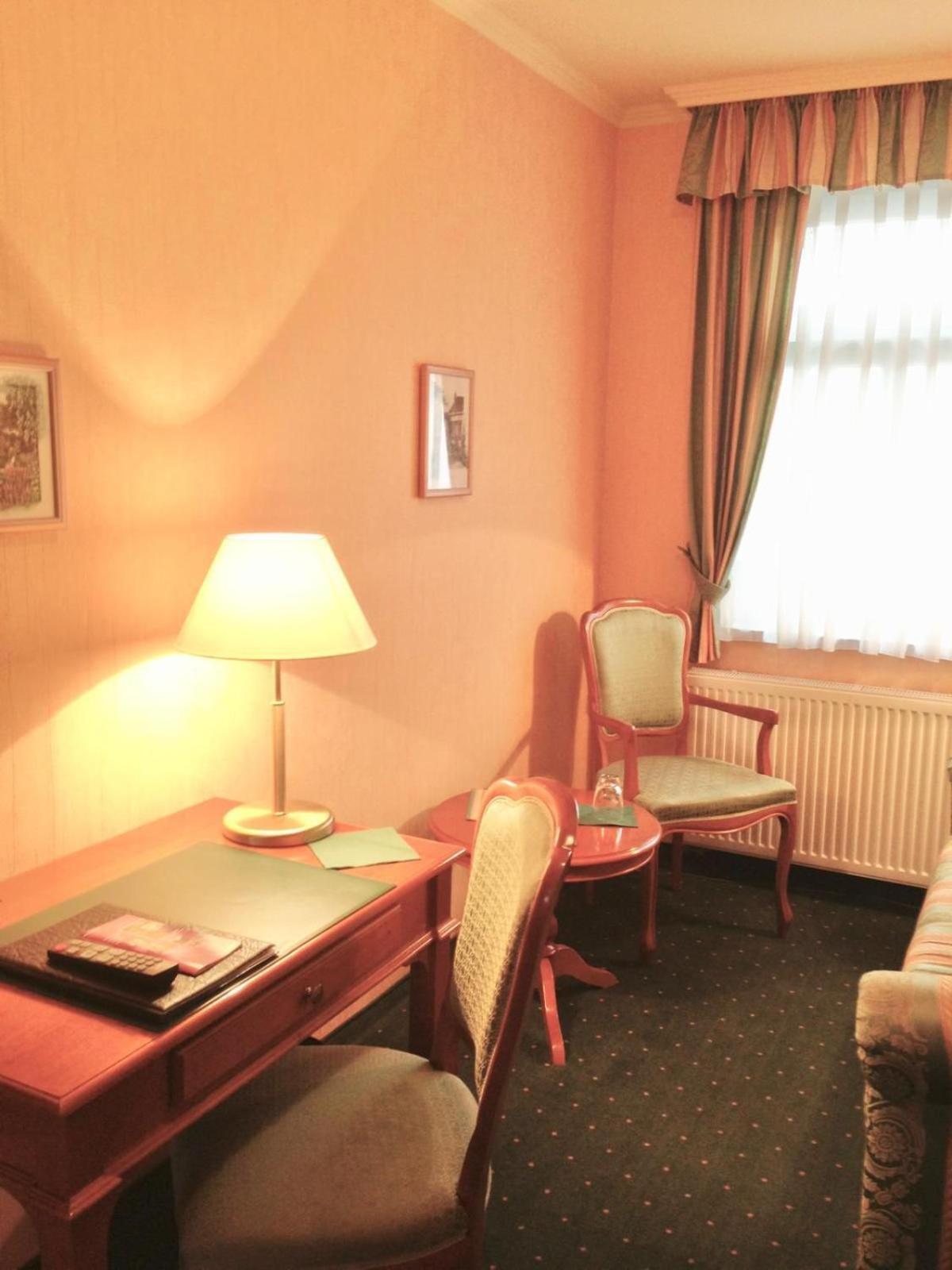 Pension Alter Kutschenbauer ヴェルニゲローデ 部屋 写真